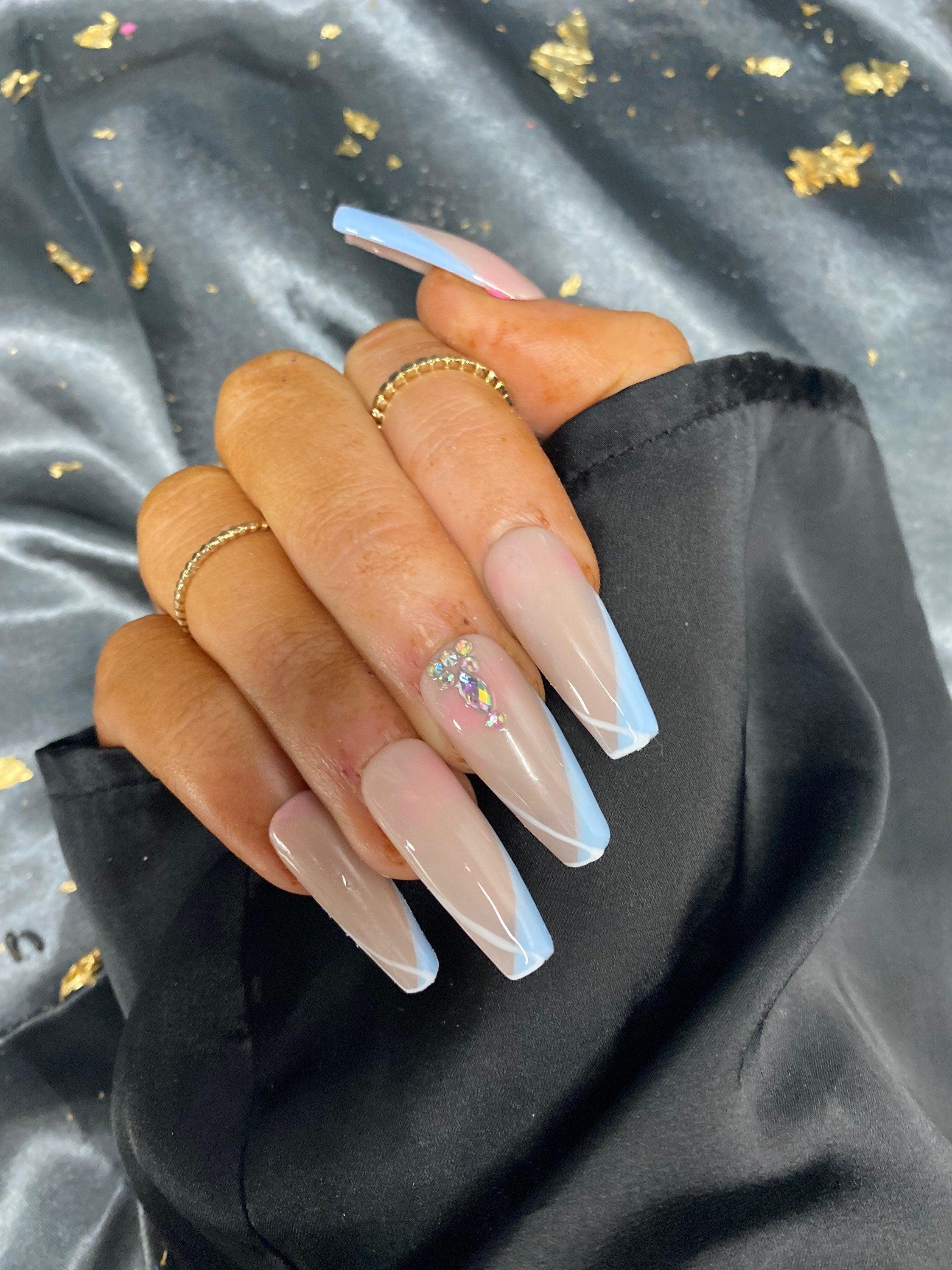 Mom Gets Shamed For Baby's Nails After Sharing Photo Of Her Manicure |  iHeart